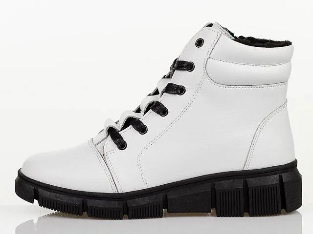 Ocieplane botki damskie – idealne obuwie na zimę